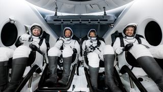 The Polaris Dawn crew of Anna Menon (at left), Scott Poteet, Jared Isaacman and Sarah Gillis seen aboard Dragon "Resilience" after their splashdown and recovery, Sept. 15, 2024.