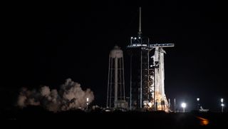 A SpaceX Falcon 9 rocket with the company's Crew Dragon spacecraft onboard is seen on the launch pad at Launch Complex 39A during a brief static fire test ahead of NASA’s SpaceX Crew-3 mission, Thursday, Oct. 28, 2021, at NASA’s Kennedy Space Center in Florida.
