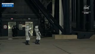 NASA's Crew-6 astronaut crew arrives at the SpaceX Falcon 9 rocket late on March 1, 2023, three hours before their planned launch at 12:45 a.m. EST on March 2 from the Kennedy Space Center in Florida.